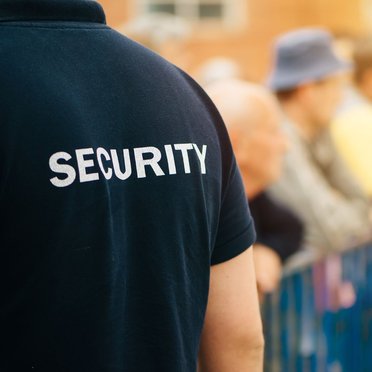 T-shirt mit Aufschrift "Security" auf dem Rücken